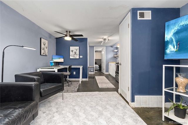 living room with ceiling fan