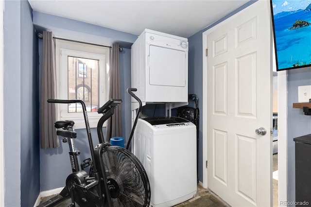 washroom with stacked washer / dryer