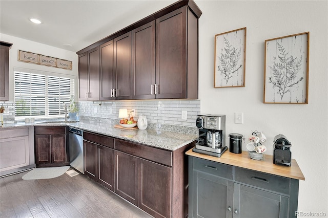 240 S Oak Hill St, Aurora, CO 80018 - kitchen with a sink, stainless steel dishwasher, backsplash, wood finished floors, and dark brown cabinetry