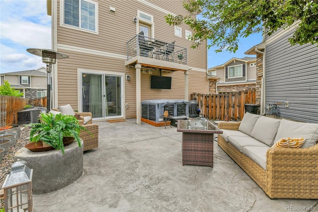 240 S Oak Hill St, Aurora, CO 80018 - view of patio featuring an outdoor hangout area, a balcony, and cooling unit