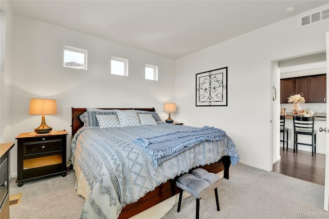 240 S Oak Hill St, Aurora, CO 80018 - bedroom with light colored carpet and baseboards