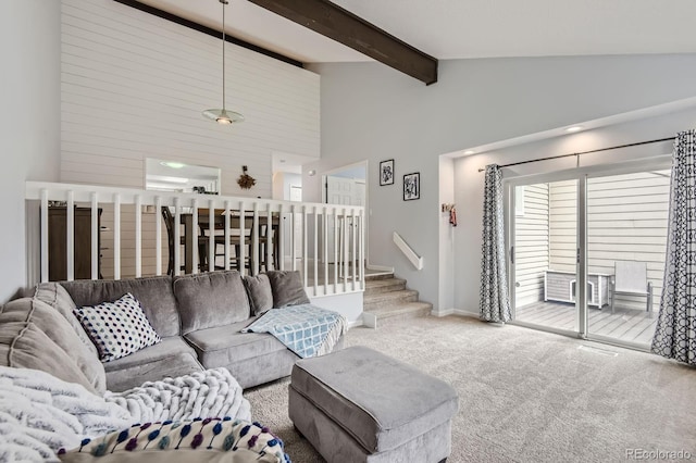 7640 S Monaco Cir W, Centennial, CO 80112 - carpeted living room with stairs and baseboards