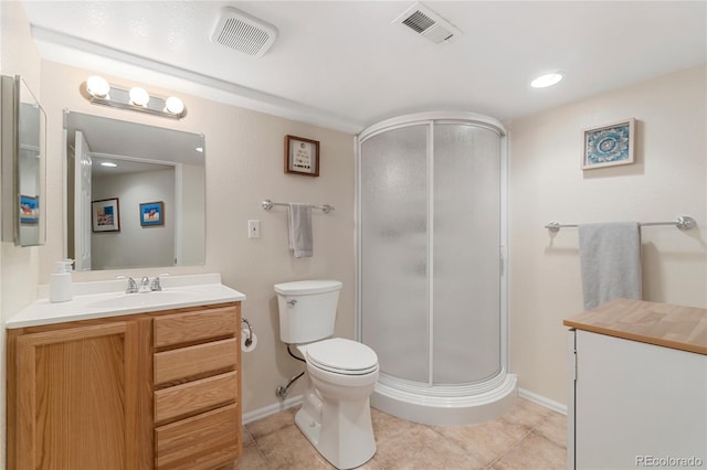 full bathroom with a shower stall, tile patterned flooring, visible vents, and vanity