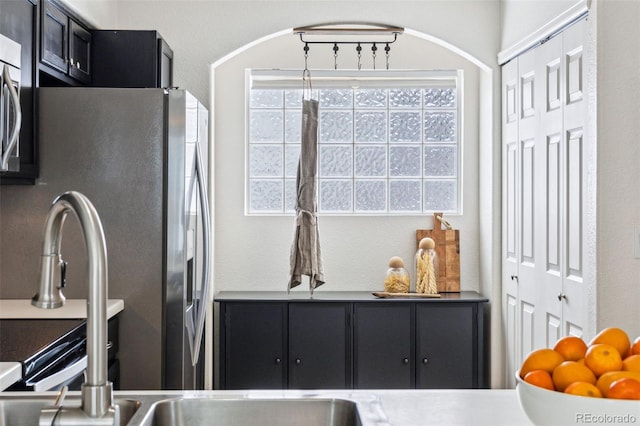 kitchen featuring stainless steel fridge