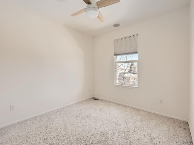 unfurnished room with ceiling fan