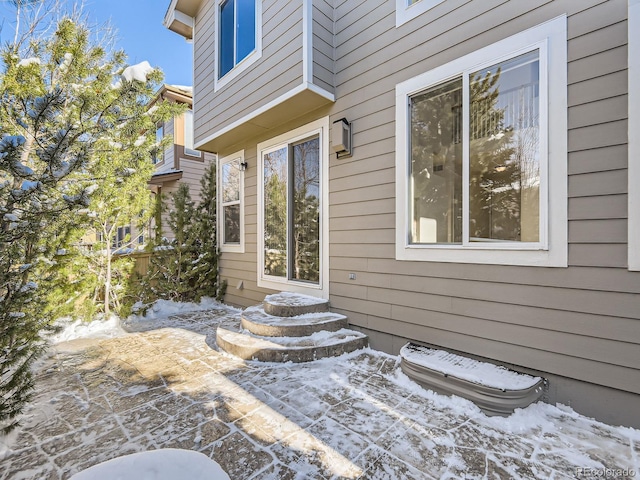 view of snow covered patio