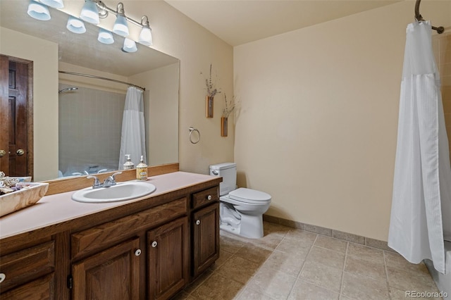 bathroom with vanity, a shower with shower curtain, toilet, and tile patterned flooring