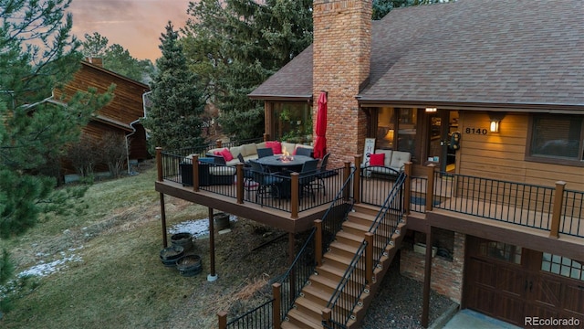 wooden terrace featuring stairway and an outdoor hangout area