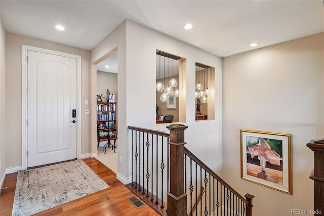 12121 Bryant St, Westminster, CO 80234 - entrance foyer featuring wood finished floors and recessed lighting