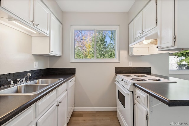 kitchen with white cabinets, light wood-type flooring, white appliances, and sink