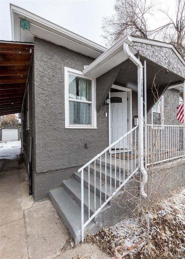 1726 E Evans Ave, Pueblo, CO 81004 - view of front of property with stucco siding