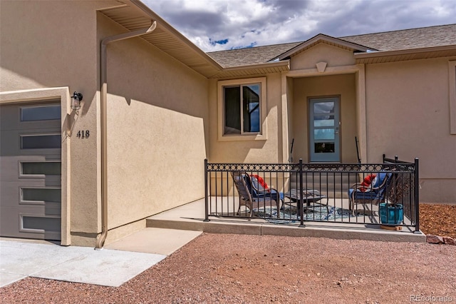 property entrance featuring a garage