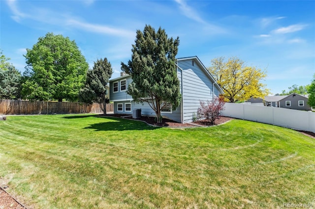 1606 S Flanders Way, Aurora, CO 80017 - back of property with central AC