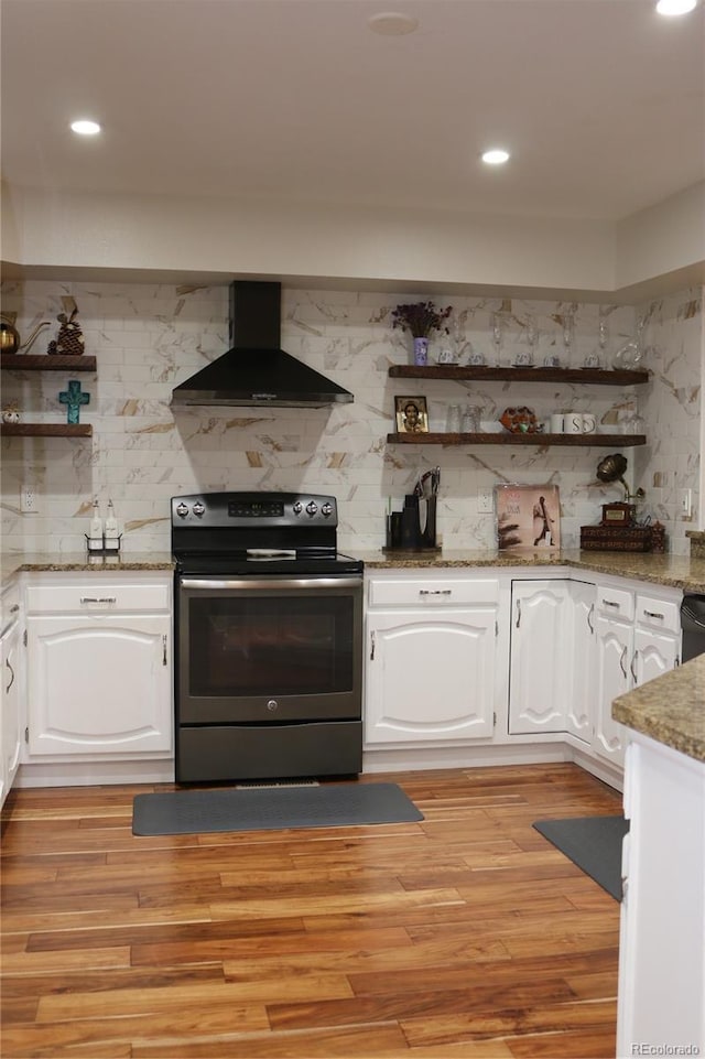 8747 Mesquite Row, Lone Tree, CO 80124 - kitchen with electric range, open shelves, wall chimney exhaust hood, tasteful backsplash, and recessed lighting