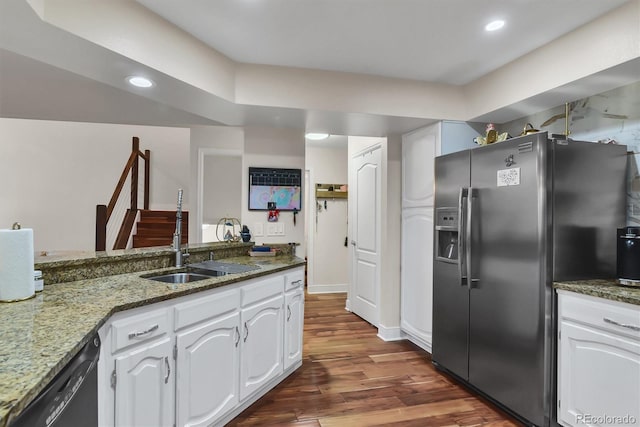 8747 Mesquite Row, Lone Tree, CO 80124 - kitchen with stainless steel fridge with ice dispenser, black dishwasher, dark wood-type flooring, dark stone counters, and white cabinets