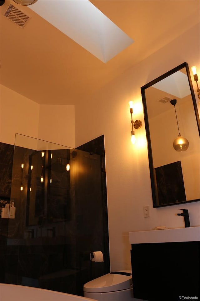 8747 Mesquite Row, Lone Tree, CO 80124 - full bathroom with vanity, a walk in shower, and a skylight