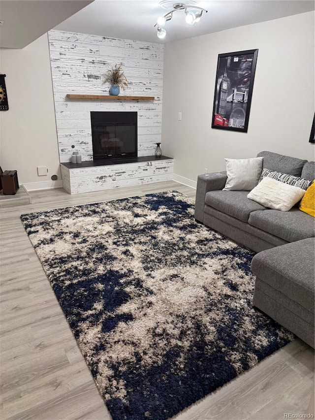 8747 Mesquite Row, Lone Tree, CO 80124 - living room with a fireplace and wood finished floors