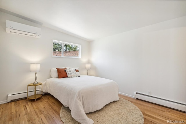 6170 Estes Ct, Arvada, CO 80004 - bedroom featuring light wood-style flooring, lofted ceiling, a wall unit AC, and baseboard heating