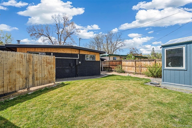 6170 Estes Ct, Arvada, CO 80004 - view of yard featuring a fenced backyard