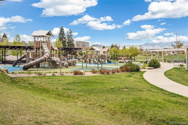 6170 Estes Ct, Arvada, CO 80004 - community jungle gym featuring a mountain view and a yard
