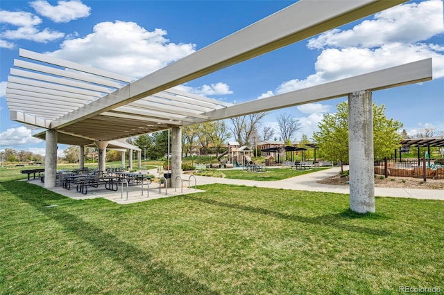 6170 Estes Ct, Arvada, CO 80004 - view of property's community with a lawn, a pergola, and playground community