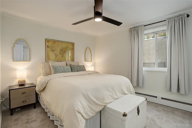336 N Grant St Unit 206, Denver, CO 80203 - bedroom featuring light colored carpet, ornamental molding, a ceiling fan, and a baseboard heating unit