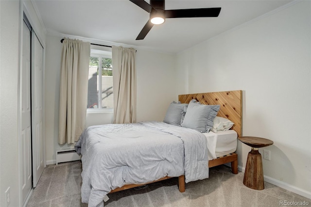 336 N Grant St Unit 206, Denver, CO 80203 - carpeted bedroom with baseboards, ornamental molding, a ceiling fan, and a baseboard heating unit