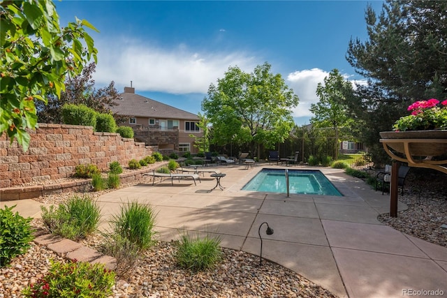 view of pool featuring a patio and a pool