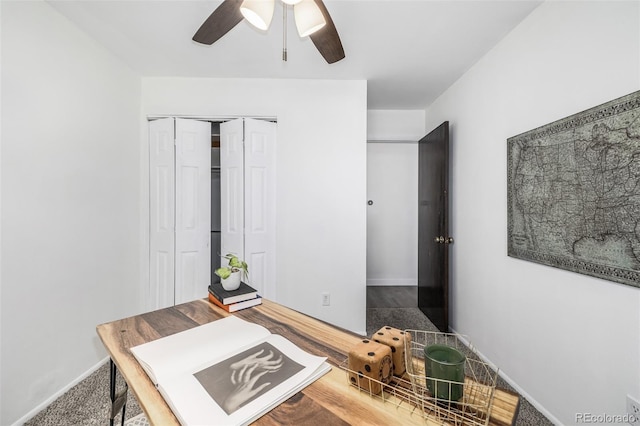 office featuring hardwood / wood-style floors and ceiling fan