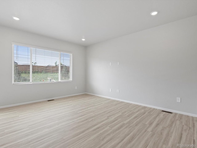 1134 Thunder Pass Rd, Severance, CO 80550 - empty room featuring light wood-type flooring and recessed lighting