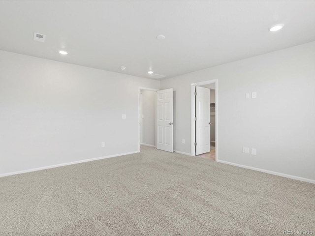 1134 Thunder Pass Rd, Severance, CO 80550 - spare room with light carpet and recessed lighting