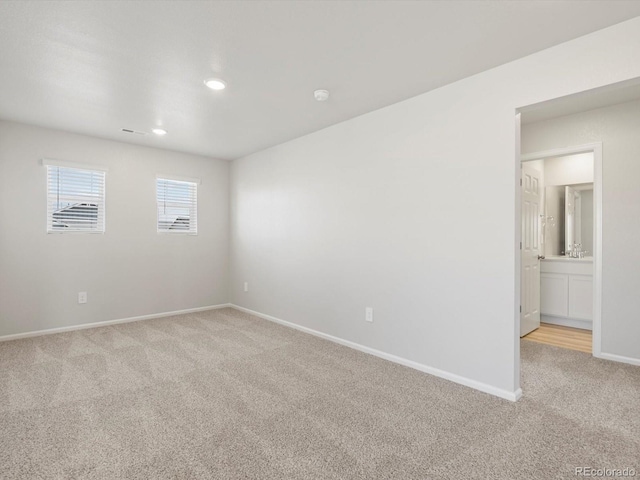 1134 Thunder Pass Rd, Severance, CO 80550 - empty room featuring light carpet and recessed lighting