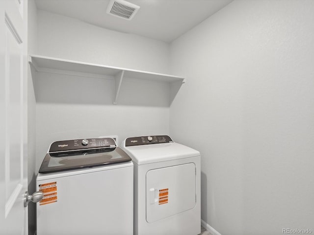 1134 Thunder Pass Rd, Severance, CO 80550 - washroom featuring washer and clothes dryer and baseboards