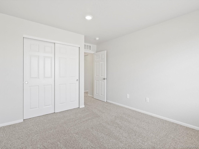 1134 Thunder Pass Rd, Severance, CO 80550 - unfurnished bedroom featuring carpet, a closet, and recessed lighting
