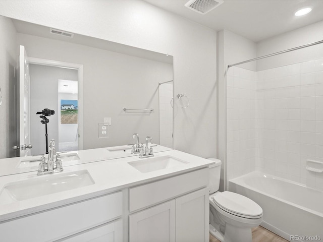 1134 Thunder Pass Rd, Severance, CO 80550 - full bathroom featuring double vanity, shower / washtub combination, and wood finished floors