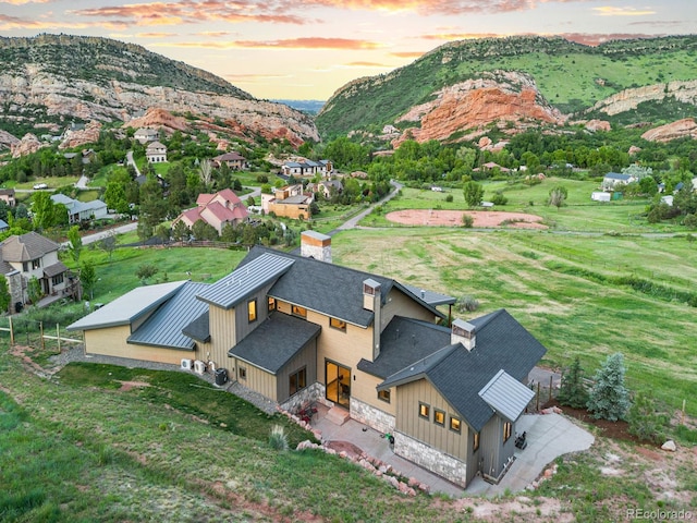 12947 Lazy Dog Ln, Littleton, CO 80127 - aerial view of property and surrounding area featuring a mountainous background