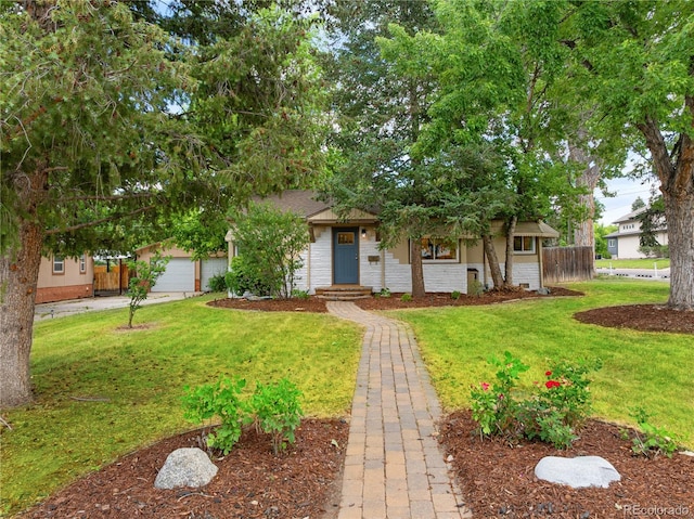 2680 S Garfield Cir, Denver, CO 80210 - view of property hidden behind natural elements featuring driveway and a garage