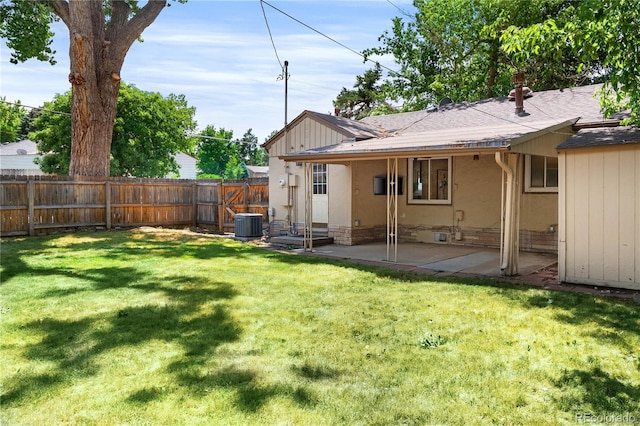 2680 S Garfield Cir, Denver, CO 80210 - back of house featuring roof with shingles and a patio