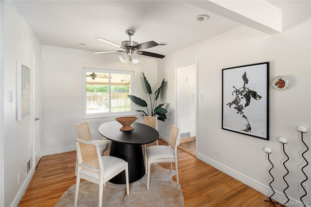 2680 S Garfield Cir, Denver, CO 80210 - dining room with light wood-style flooring and a ceiling fan
