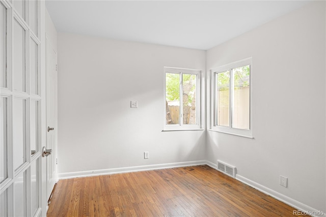 2680 S Garfield Cir, Denver, CO 80210 - unfurnished bedroom with baseboards and hardwood / wood-style flooring