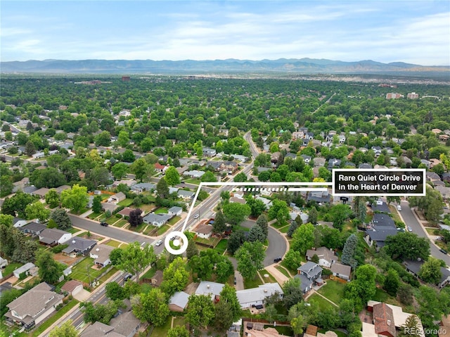 2680 S Garfield Cir, Denver, CO 80210 - aerial view of residential area with a mountain backdrop and property boundaries highlighted