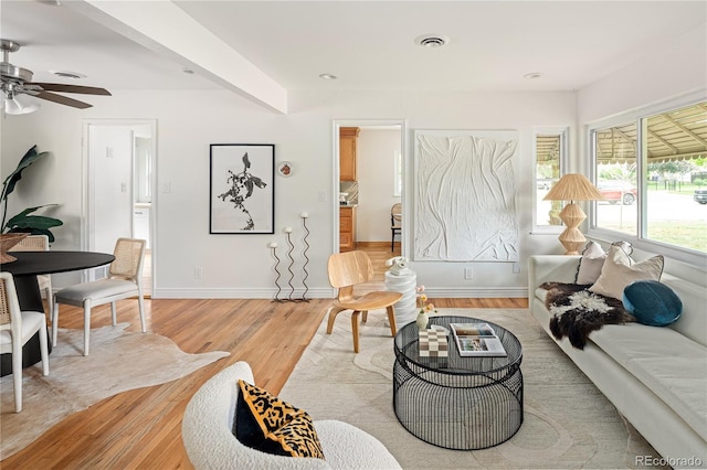 2680 S Garfield Cir, Denver, CO 80210 - living area featuring light wood-type flooring and ceiling fan