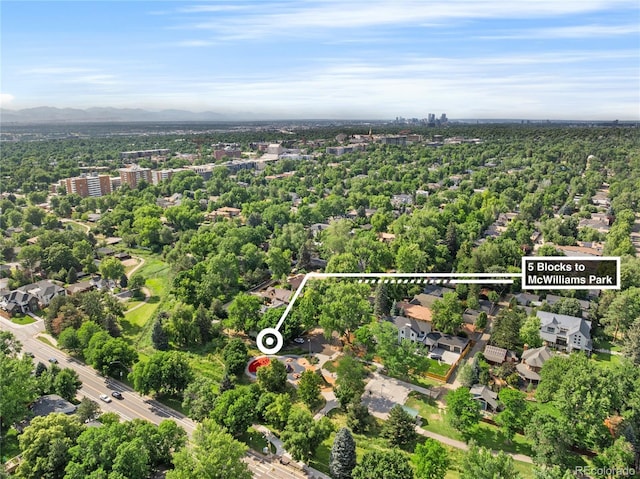 2680 S Garfield Cir, Denver, CO 80210 - aerial view of property's location with property boundaries highlighted and a mountain backdrop
