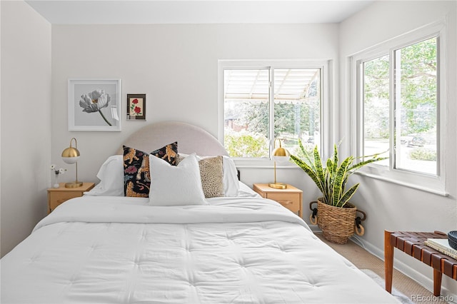 2680 S Garfield Cir, Denver, CO 80210 - carpeted bedroom with baseboards and radiator heating unit