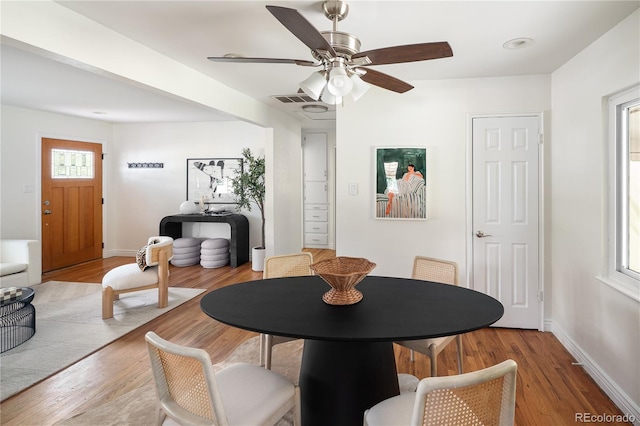 2680 S Garfield Cir, Denver, CO 80210 - dining area featuring light wood-style flooring and ceiling fan