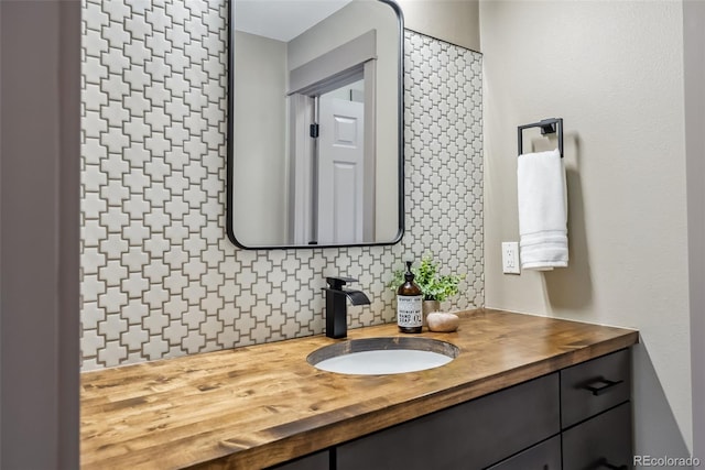143 Brady Rd, Buena Vista, CO 81211 - bathroom with vanity and tasteful backsplash