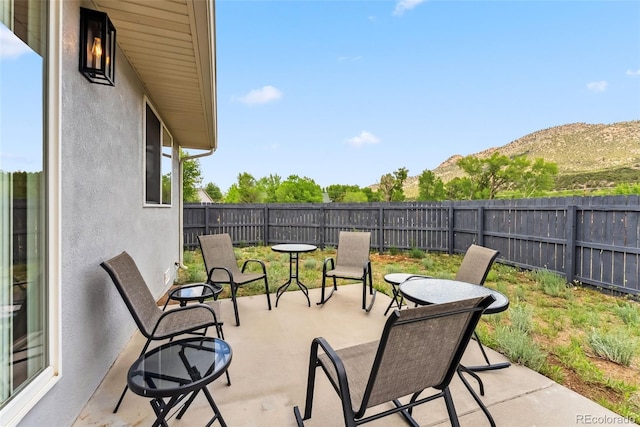 143 Brady Rd, Buena Vista, CO 81211 - fenced backyard with a patio area and a mountain view