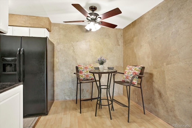 7755 E Quincy Ave Unit 206, Denver, CO 80237 - dining room with light wood finished floors and a ceiling fan