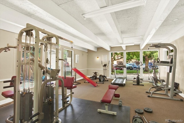7755 E Quincy Ave Unit 206, Denver, CO 80237 - exercise room featuring beamed ceiling, plenty of natural light, and carpet floors