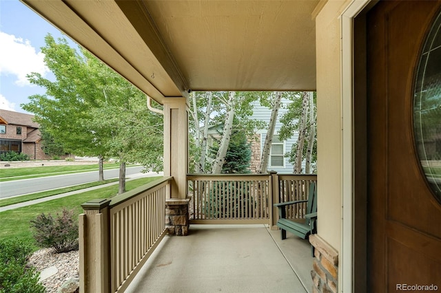 balcony featuring covered porch